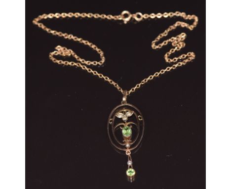 Edwardian 9ct gold pendant set with peridot and seed pearl on 9ct gold chain, 3.9g&nbsp;