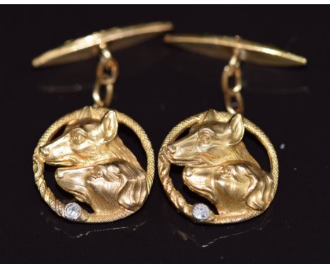 A pair of c1920 18ct gold cufflinks in the form of hounds, each set with a diamond, 10g, in fitted Asprey box