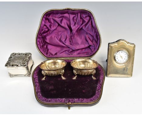 Cased pair of Victorian hallmarked silver open salts each raised on three feet, London 1881, maker&nbsp;Chawner &amp; Co, Edw