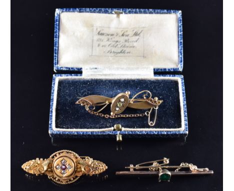 Edwardian 15ct gold&nbsp;brooch set with a ruby and old cut diamonds, verso a glass compartment (5.6g), 9ct gold brooch set w