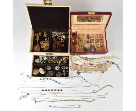 A collection of costume jewellery including silver fob chain, silver locket, Miracle brooch, chains, silver ring set with mar