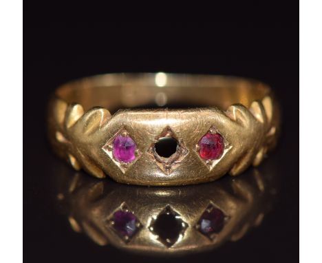 A c1910 18ct gold ring set with two rubies (one stone missing), 2.5g, size H/I