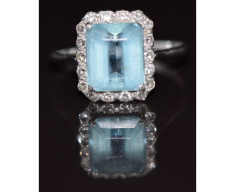 Art Deco 18ct white gold ring set with a 2.5ct emerald cut aquamarine surrounded by diamonds, 3.1g, size N