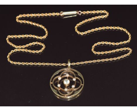 Edwardian 15ct gold pendant set with an aquamarine and seed pearls, on 9ct gold rope twist chain with barrel clasp, 5.7g&nbsp