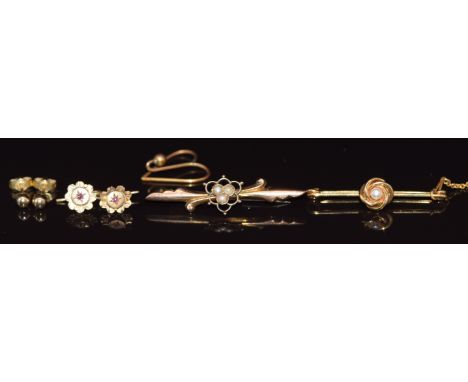 Two 9ct gold brooches set with seed pearls (3.2g), Victorian 9ct gold earrings each set with a ruby in a star setting, 9ct go