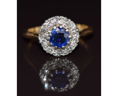 Art Deco 18ct gold ring set with a round cut sapphire surrounded by diamonds, 3.7g, size L