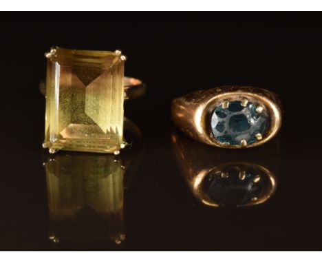 An 18ct gold ring set with topaz (5g) and a 9ct gold ring set with quartz, 6g, size K