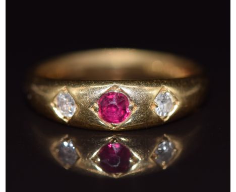 A c1900 18ct gold ring set with a ruby and diamonds, 4.3g, size K
