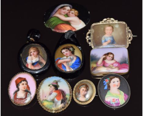 A collection of porcelain portrait miniatures, including two Victorian examples in a jet surround&nbsp;
