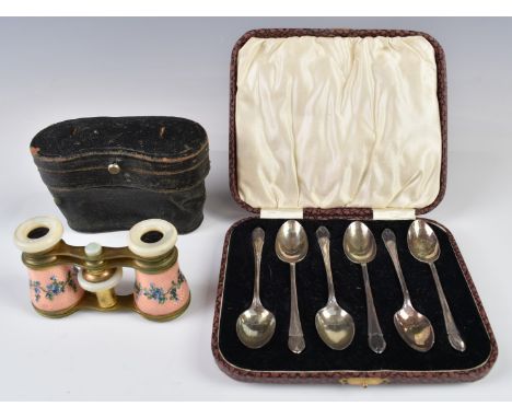 Cased set of six hallmarked silver teaspoons, weight 49g, and a cased pair of guilloché enamel and mother of pearl opera glas