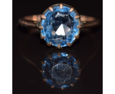 A 9ct gold ring set with a round cut topaz, 2.7g, size O