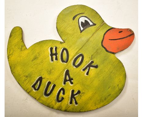 Hook A Duck - A vintage 20th century fairground / funfair hand painted sign in the form of duck. The duck finished in yellow 