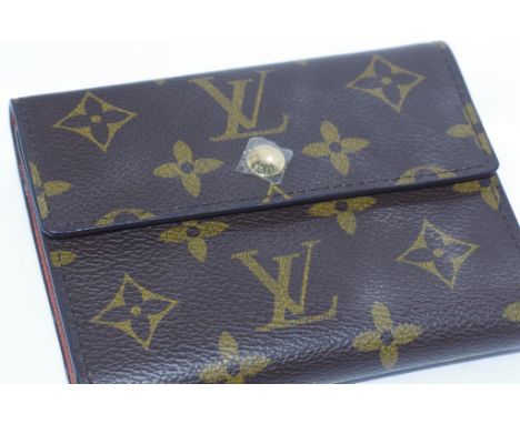 Louis Vuitton Monogram wallet Made in France, with internal card and purse compartments, LV Pattern, gold button Louis Vuitto