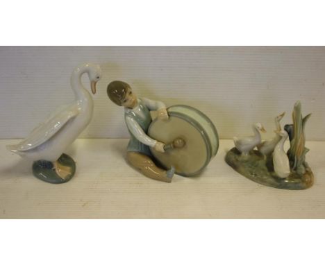 Lladro boy with drum figure 12cm high, together with 2 Nao duck figures