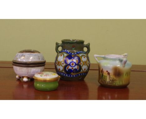 Royal Bayreuth lidded trinket box and vase together with a miniature Gouda vase and an English enamel pill box