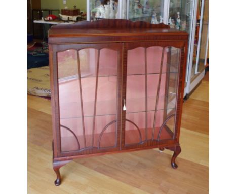 Art deco display cabinet with 2 inside glass shelves, standing on squat cabriole legs, 107cm wide, 32cm deep and 127cm high