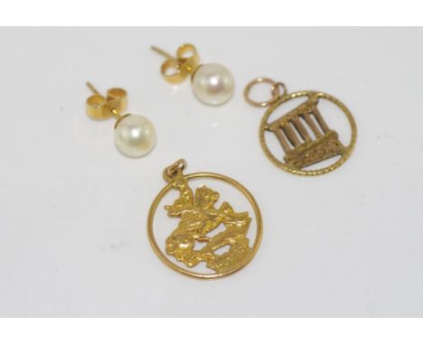 Two gold pendants with a 9ct pair pearl studs Pendants 18ct (knight) and 14ct (Greek)  total weight: approx 2.6 grams, studs 