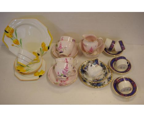Quantity of cups with saucers and trios and extras, comprising of Shelley, Paragon, Tuscan and Royal Albert