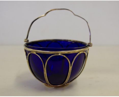 Sterling silver blue glass lined sweet dish with handle, hallmarked Birmingham 1961, 11 cm diameter approx., 121 grams approx