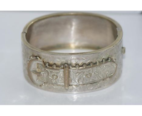 Victorian buckle hinged bangle with engraving, tests as low grade silver