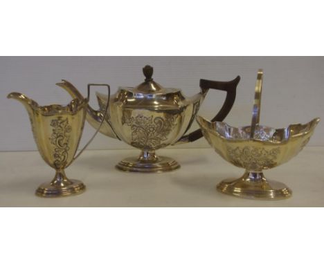 Three piece sterling silver teaset hallmarked Chester 1884, to include teapot, sugar and creamer, 658grams approx