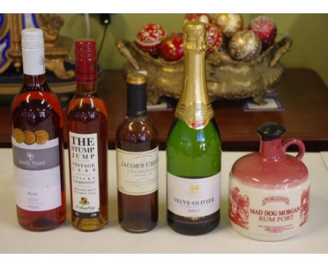 Four assorted bottles of wine and a 750ml Mad Dog Morgan Rum Port