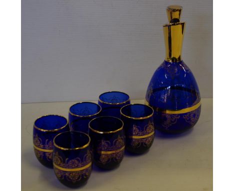 Cobalt blue with gilt decoration glass drink set to include a decanter and 6 glasses