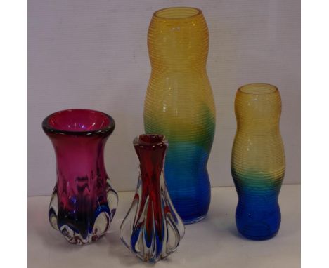 Four art glass vases 35cm high (tallest) approx.