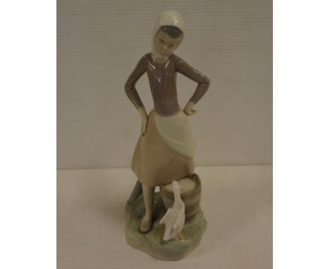 Lladro girl with duck figurine 23.5 cm high