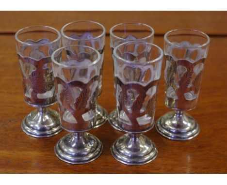 Six sterling silver mounted shot glasses made in Mexico, 7cm high