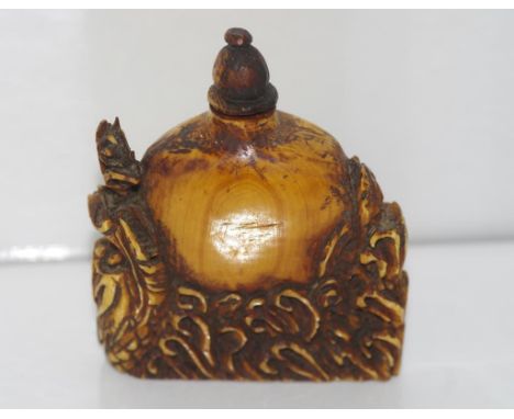 Antique Ivory snuff bottle with dragon decoration height: approx 6.5cm NB this item may not be exported.