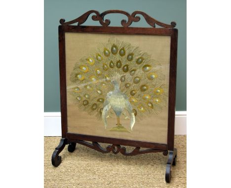 EARLY 20TH CENTURY OAK FIRE SCREEN with male peacock embroidered linen behind glass, 91cms high