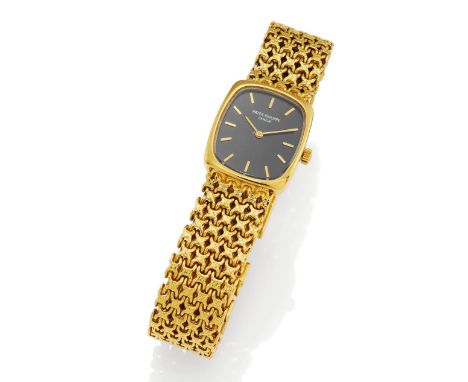   PATEK PHILIPPE PATEK PHILIPPE  Ellipse. Schweiz. Um 1970.   Handaufzug. 750/- Gelbgold, integriertes Band, Zffbl. lackiert,