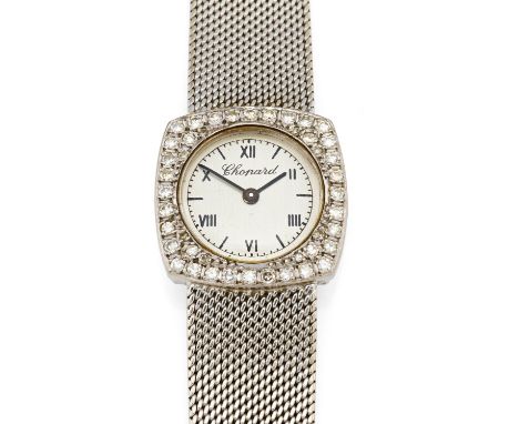   CHOPARD CHOPARD  Schweiz. Um 1970.   Handaufzug. 750/- Weißgold, Lünette mit Brillanten, integriertes Milanaise-Band, Zffbl