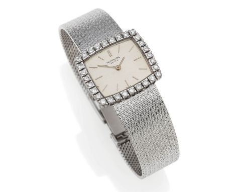   PATEK PHILIPPE PATEK PHILIPPE  Schweiz. Um 1970.   Handaufzug. 750/- Weißgold, Lünette diamantgeziert, integriertes Milanai