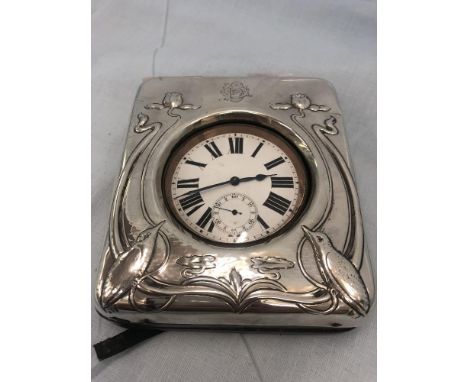 An art nouveau silver clock, in working order