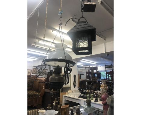 An oil lamp light fitting plus another