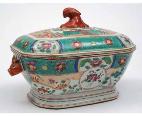 A Chinese Export octagonal tureen and cover: with boar's head handles and foliate finial, with clobbered decoration of daisie