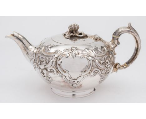 A Victorian silver teapot, maker Edward, John & William Barnard, London, 1846: of squat globular form, with embossed foliate 