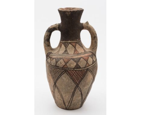 A Neolithic-style painted pottery two-handled vase: decorated in black and iron red with a hatched geometric design, 40 cm hi