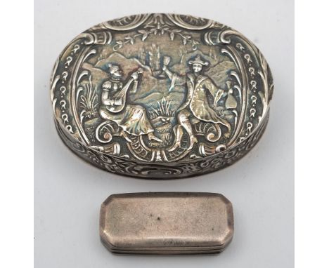 A Dutch silver snuff box: of oval outline, the hinged lid decorated with figures in a pastoral landscape, 6.5cm. wide, togeth