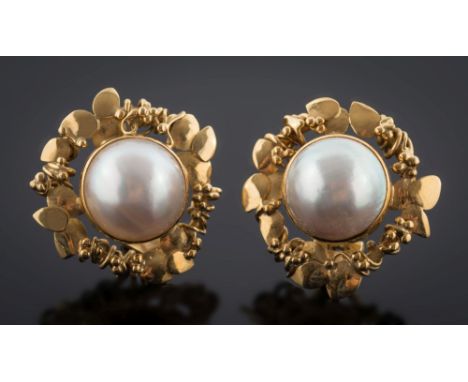 A pair of 18ct gold and single mabé cultured pearl earrings: each with a single mabé cultured pearl 13.4mm diameter within a 