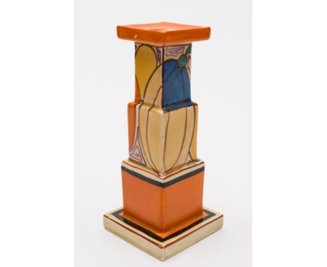 A Clarice Cliff pottery candlestick in the Melon (Picasso Fruit) pattern: of stepped square profile (shape 392) enamelled wit