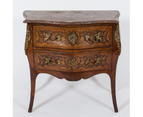A late 19th Century French kingwood, satinwood, floral marquetry and gilt metal mounted bombe commode in the Louis XV taste:,