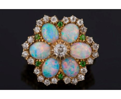 A late 19th century gold, opal, diamond and demantoid garnet round brooch: with six oval opals centring in a single diamond w