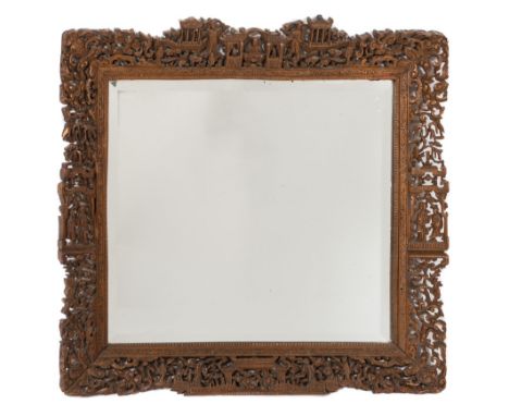 A Chinese carved wood rectangular mirror:, with inset bevelled plate, the surround pierced and decorated with figures, pagoda