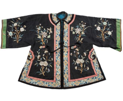 A Chinese silk work court robe: the red field with all over floral designs and panel to the back with a phoenix, together wit