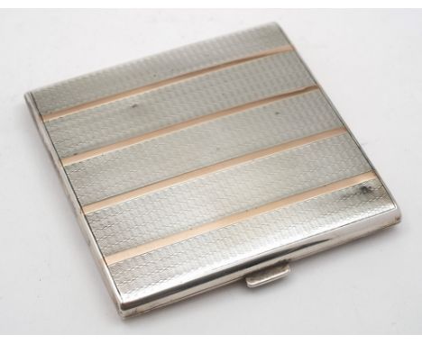 A George V silver and gold inlaid cigarette case, maker William Neale & Son Ltd, Birmingham, 1927: of rectangular outline, wi