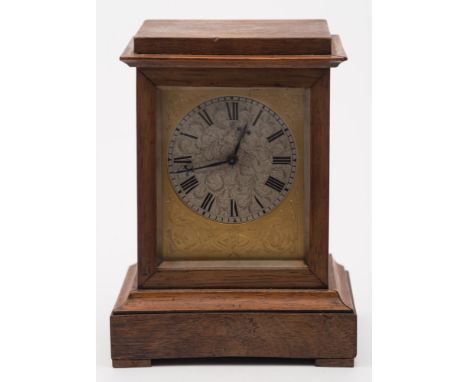 A small French mantel clock: the eight-day duration movement having a tic-tac escapement and stamped on the backplate with th