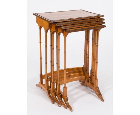 A set of late 19th Century satinwood and inlaid quartetto tables:, bordered with ebony lines, the rectangular tops with eboni